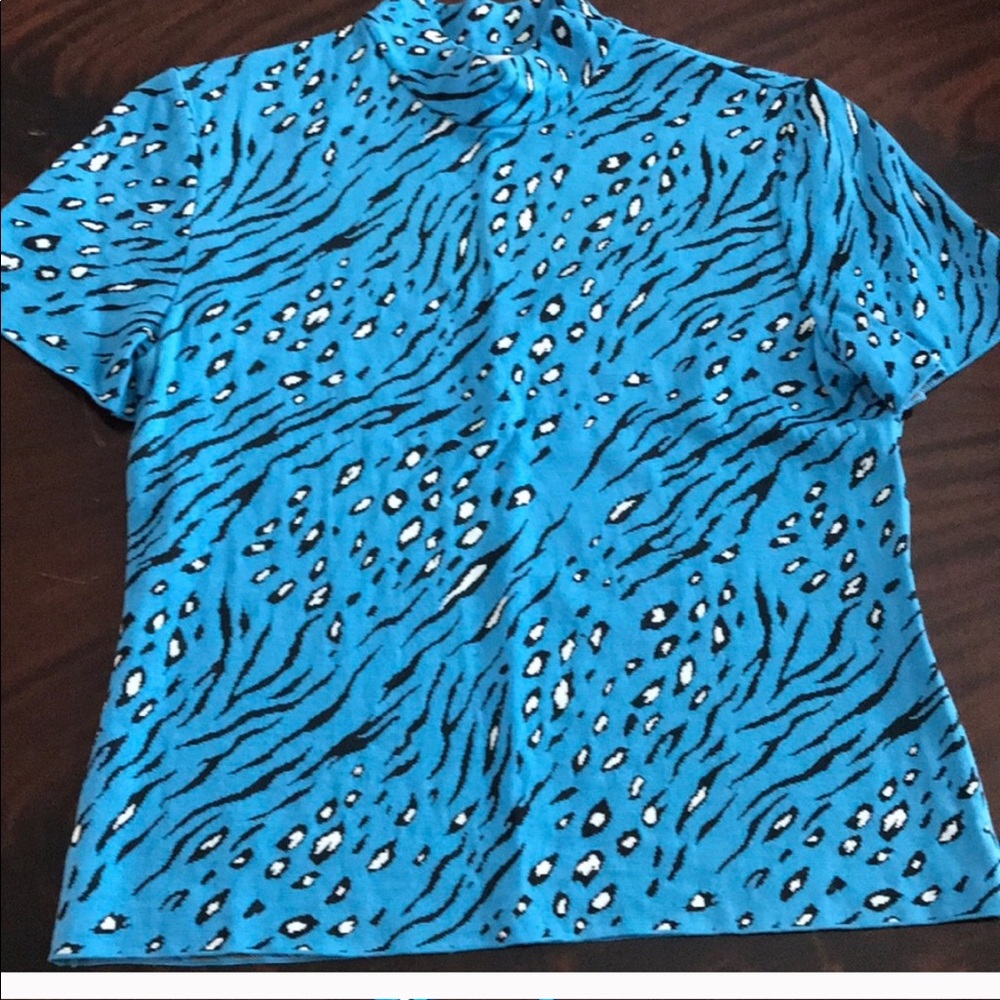 St. John, mock turtleneck. Rayon, viscose knit.